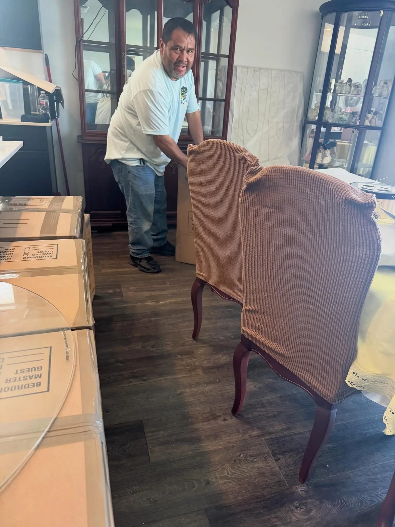 Kong Movers crew carefully packing and moving furniture in Salt Lake City